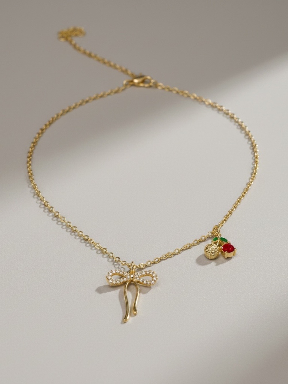 Gold Bow and Cherry Pendant Necklace - Gold